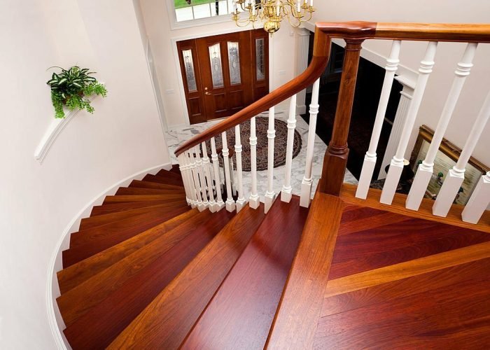 Grand Foyer Down Beautiful Winding Hardwood Staircase in Showcase Home